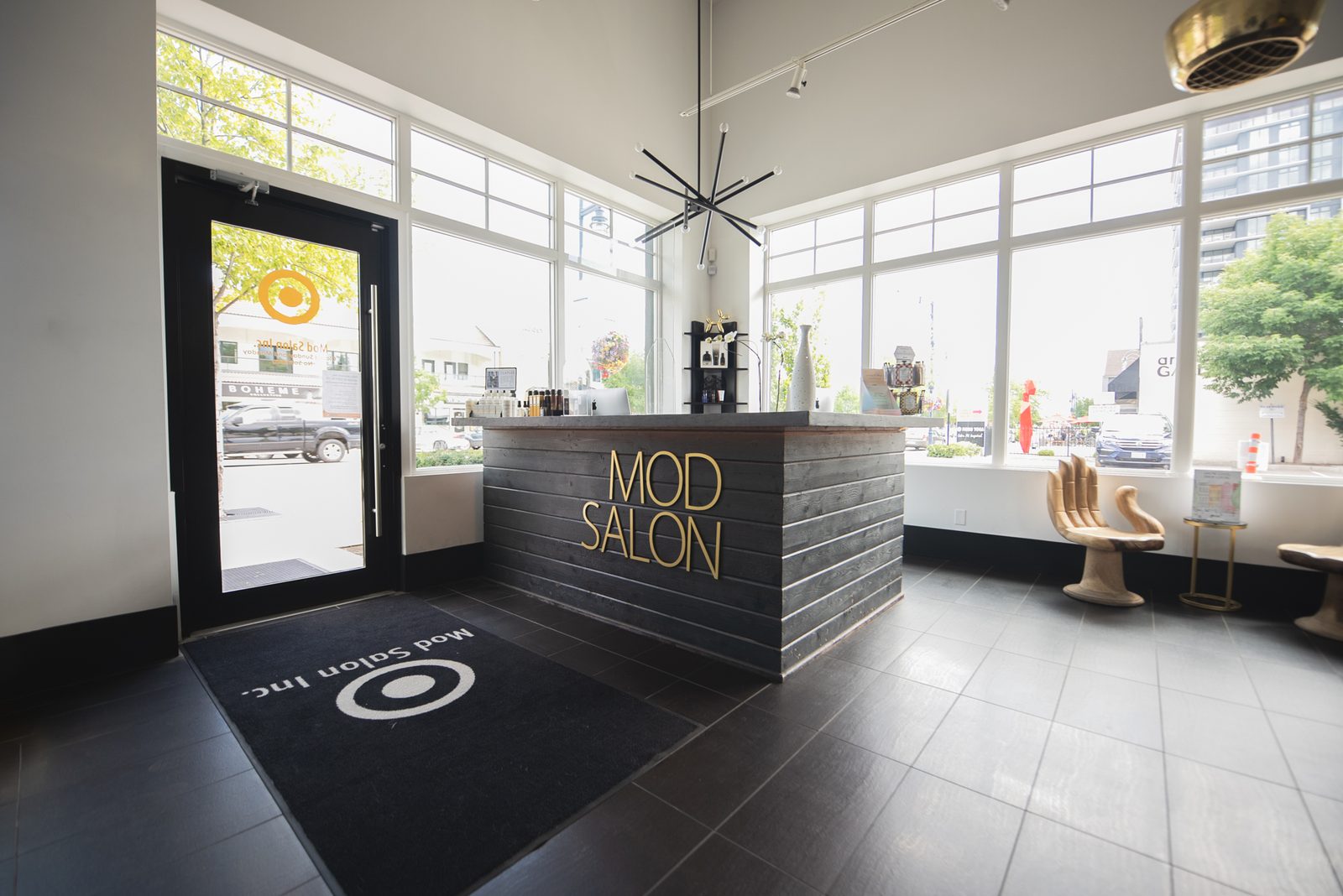 The reception desk with the gold MOD signage