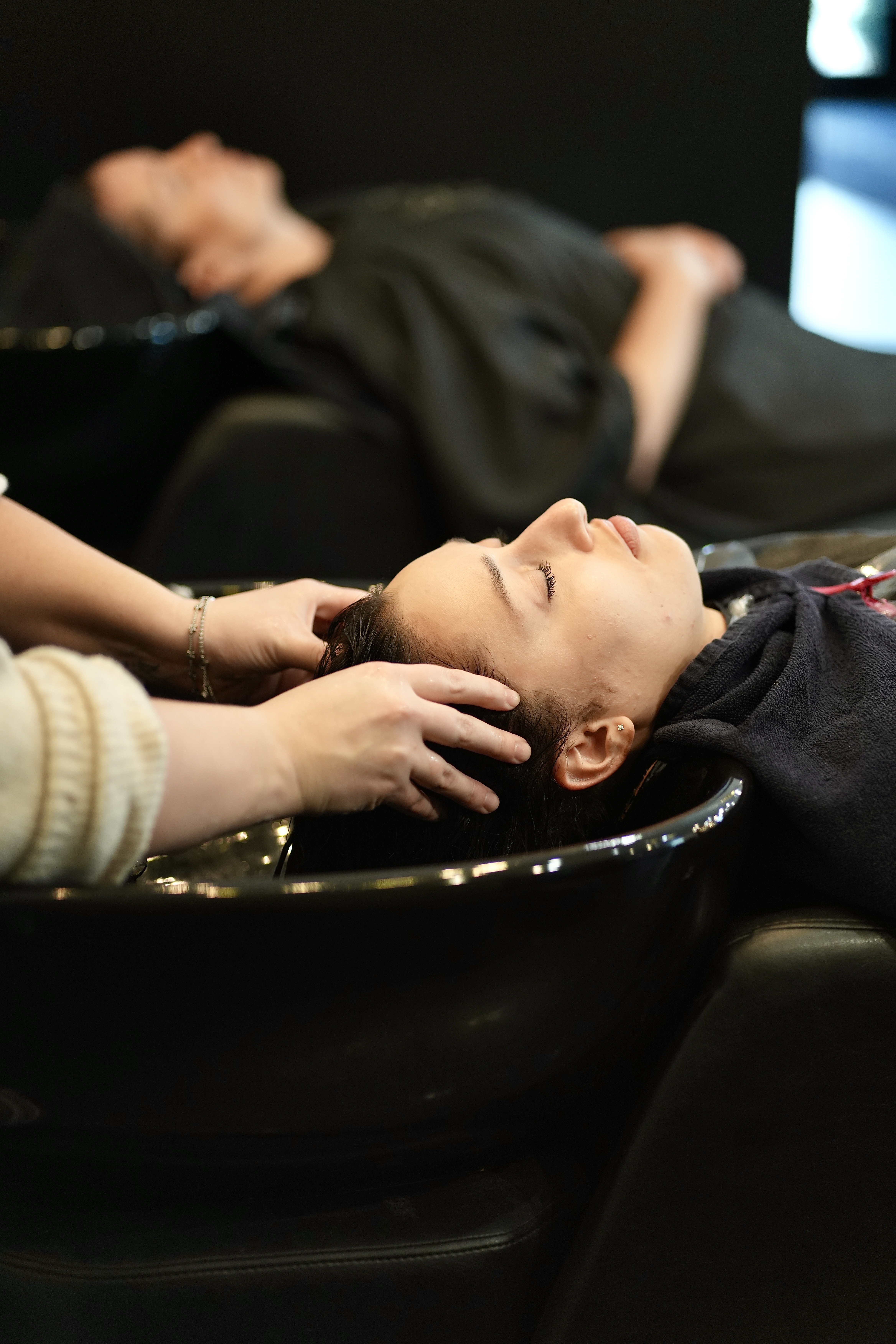 A Mod stylist mid-consultation in the salon